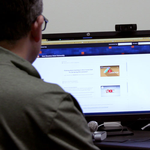 A photo of an Online employee using blackboard